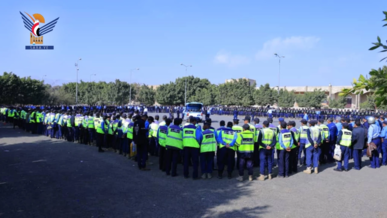  شرطة المرور تنظم وقفة احتجاجية تنديداً بجريمة الإساءة الأمريكية للقرآن الكريم