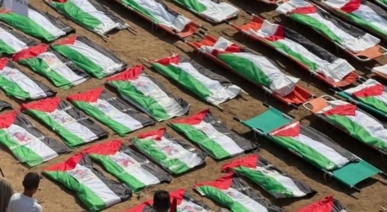 غزة تشيّع 112 شهيداً فلسطينيا أُنتشلوا من تحت الركام بعد عامين على مجزرة "أبو شريعة والحساينة"